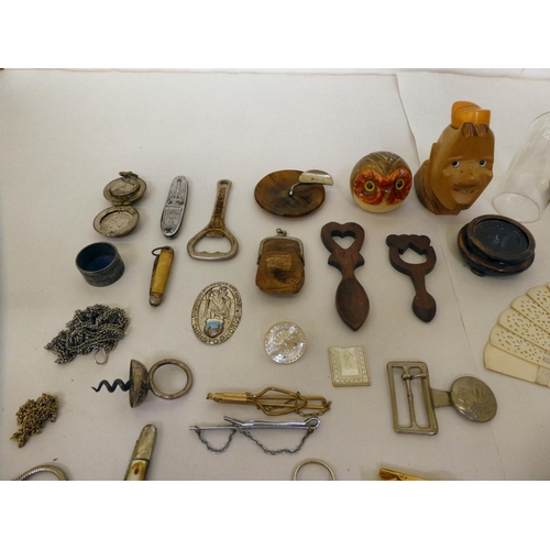 203 - Small 20thC collectables and items of personal ornament: to include money clips; and business card c... 