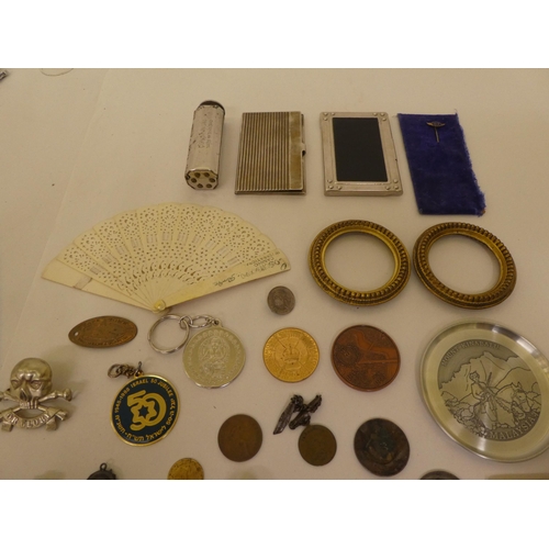 203 - Small 20thC collectables and items of personal ornament: to include money clips; and business card c... 