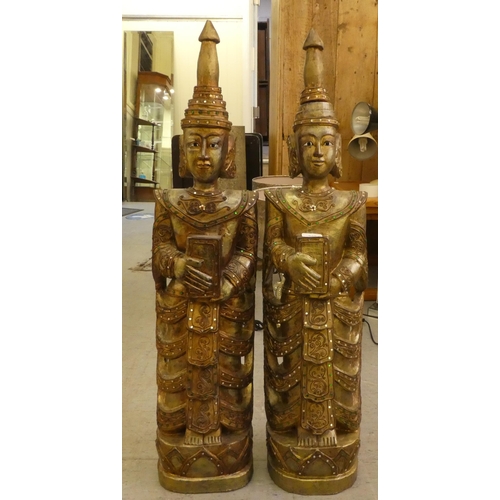 218 - A pair of modern Balinese inspired, carved wooden figures  37