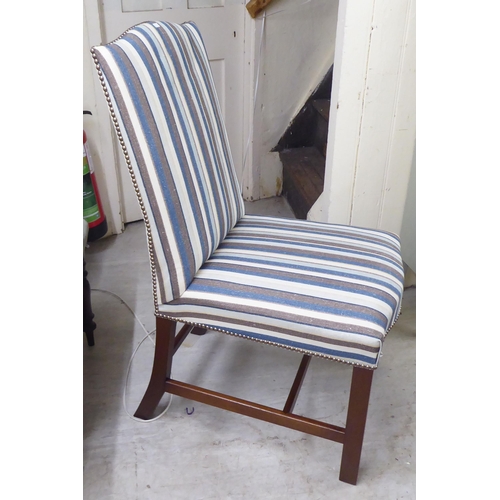 22 - Small furniture: to include A Robert Kime fabric upholstered chair and a blue painted waterfall fron... 