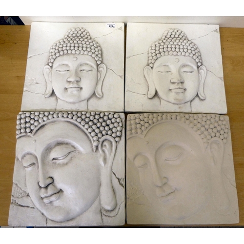 229 - Four pottery plaques, each decorated in relief with a Buddha  16