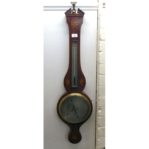 23 - A Regency satinwood inlaid mahogany wheel barometer with a silvered dial, inscribed 'Neechin Notting... 