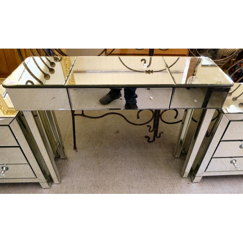 236 - Modern mirror panelled furniture, viz. a side table with a single central drawer  30.5