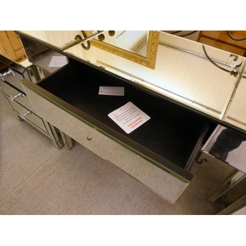 236 - Modern mirror panelled furniture, viz. a side table with a single central drawer  30.5