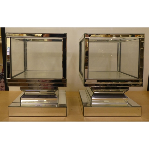 240 - A pair of modern mirrored glass table top display cases, each on stepped plinths  17