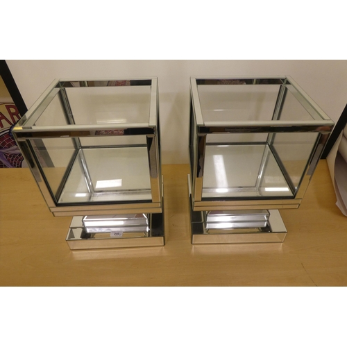 240 - A pair of modern mirrored glass table top display cases, each on stepped plinths  17