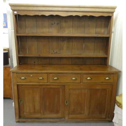 246 - A late 19th/early 20thC rustically constructed pine, two-part dresser, the superstructure with two o... 