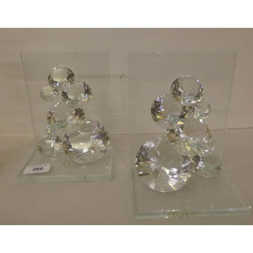 260 - Interior design accessories: to include a pair of glass bookends with crystal effect ornament  ... 