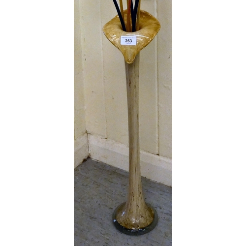 263 - A Jack in the Pulpit design glass vase, hosting a faux floral display  22