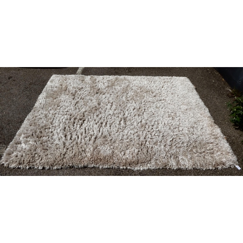 268 - Various shag pile design rugs, in different colours  largest 66