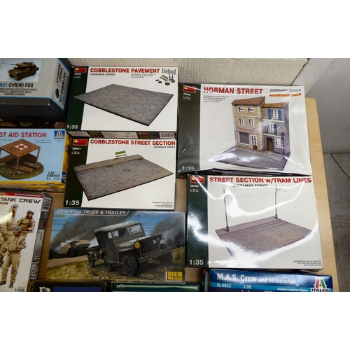 29 - 1/35 scale model kits and terrain: to include by Heller, a US 1/4 ton truck and trailer; and a ruine... 