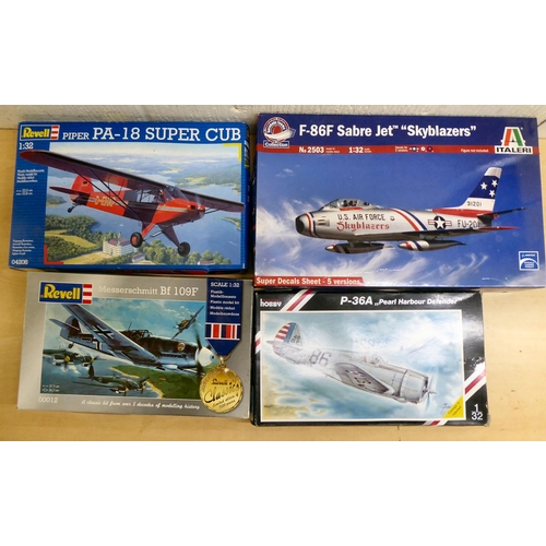 34 - 1/32 scale model kits: to include by Revell, a 'Messerschmitt Bf 109F'; and a 'F-86F Sabre Jet Skybl... 