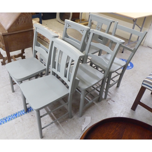 41 - Six similar blue painted dining chairs, each raised on turned legs