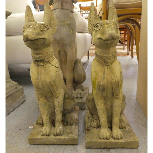 52 - Four composition stone garden ornaments: to include an Egyptian Bastet  16