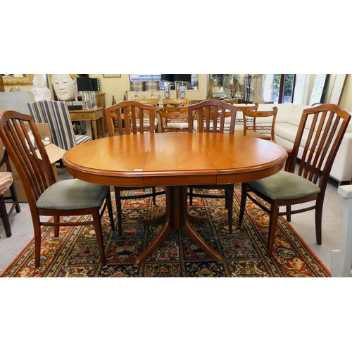 58 - A mid 20thC Stag teak dining table, raised on splayed legs  30