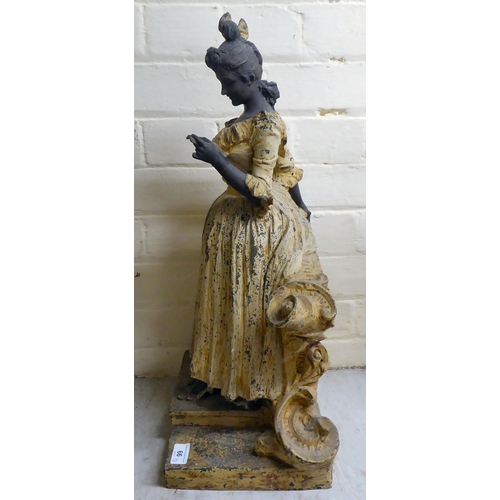 66 - A late Victorian painted spelter figure, a woman reading a letter  23