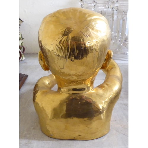 75 - A gilded pottery bust of a child  10