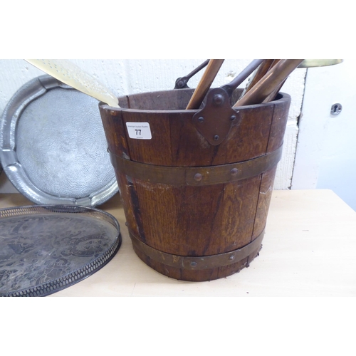 77 - A mixed lot: to include an early 20thC coopered oak coal bucket with a swing top handle