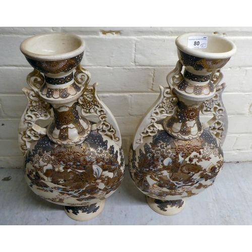 80 - A pair of early 20thC Japanese earthenware moon flask vases, decorated with warriors  19