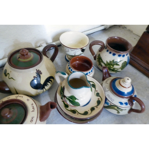 81 - Ceramics: to include a Torquay pottery Mottoware teapot