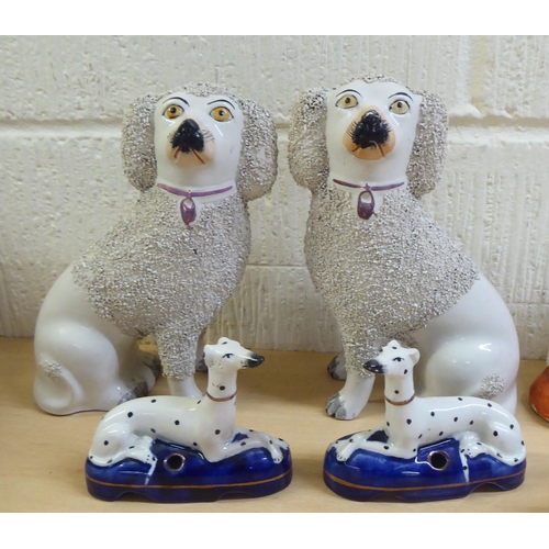 82 - Ceramics: to include a pair of late Victorian Staffordshire pottery King Charles spaniels  8