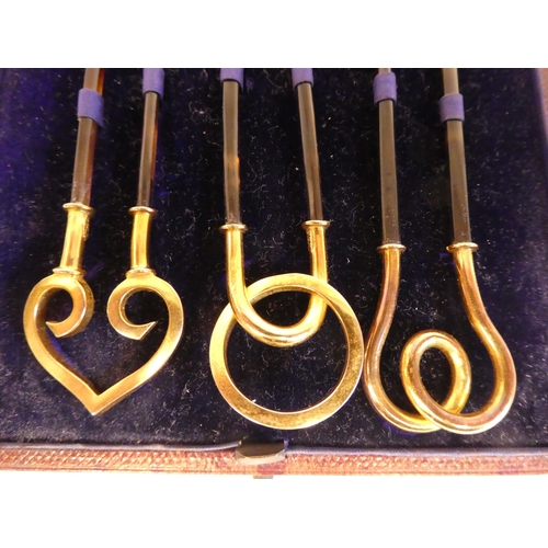 83 - A set of three late Victorian, Edward Tessier tortoiseshell hair slides with 9ct gold terminals