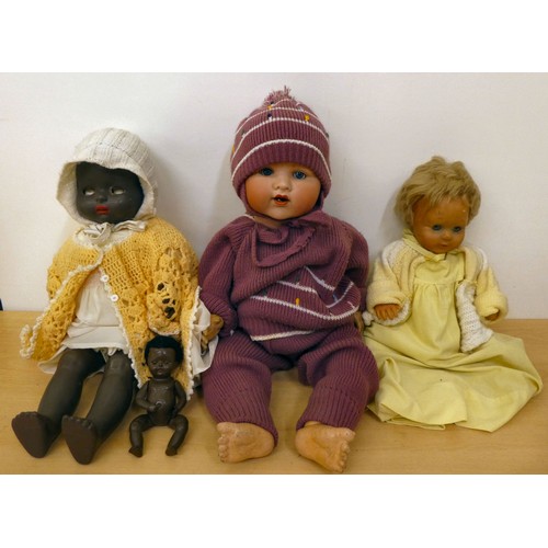 271 - Three 20thC dolls, viz. one with a composition body; one rubberised; and an Armand Marseille bisque ... 