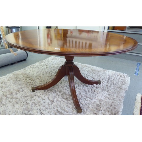 193 - A modern Regency design, walnut and satinwood inlaid, mahogany single pedestal dining table, raised ... 