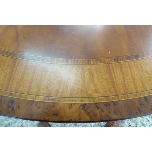 193 - A modern Regency design, walnut and satinwood inlaid, mahogany single pedestal dining table, raised ... 