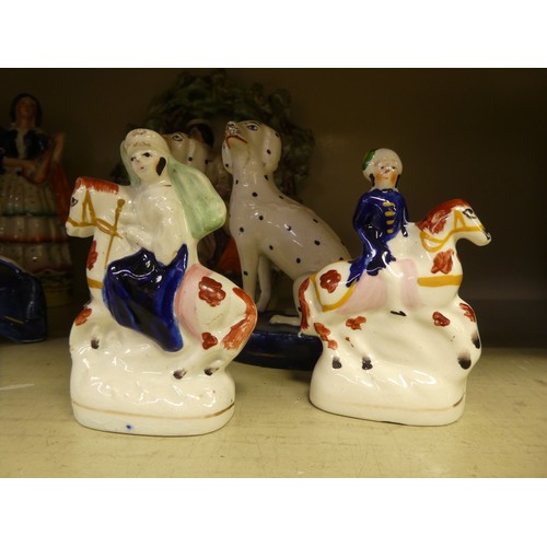 116 - Victorian Staffordshire pottery collectables: to include a man and woman, seated beneath an arbour  ... 