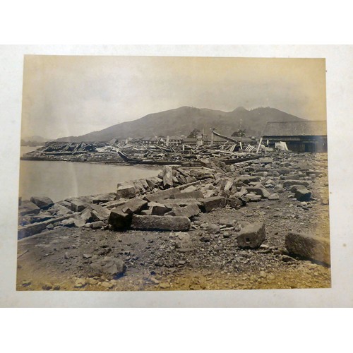 161 - An early/mid 20thC Chinese album, containing monochrome photographs: to include views of Canton; loc... 