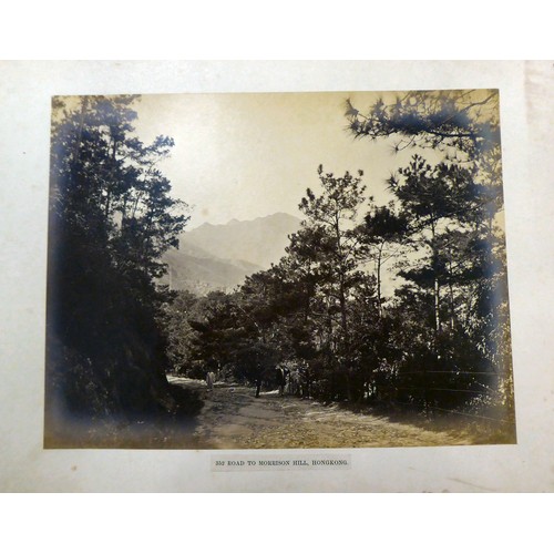 161 - An early/mid 20thC Chinese album, containing monochrome photographs: to include views of Canton; loc... 