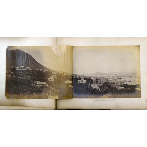 161 - An early/mid 20thC Chinese album, containing monochrome photographs: to include views of Canton; loc... 