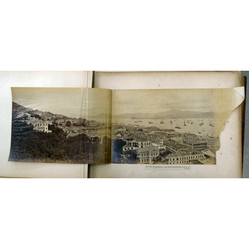 161 - An early/mid 20thC Chinese album, containing monochrome photographs: to include views of Canton; loc... 