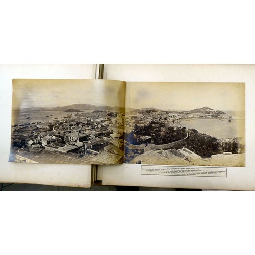 161 - An early/mid 20thC Chinese album, containing monochrome photographs: to include views of Canton; loc... 