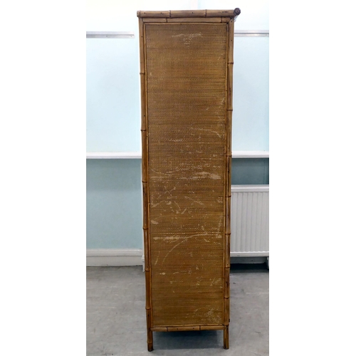 231 - A post World War II Oriental style bamboo and rattan finished wardrobe with a central mirrored door,... 