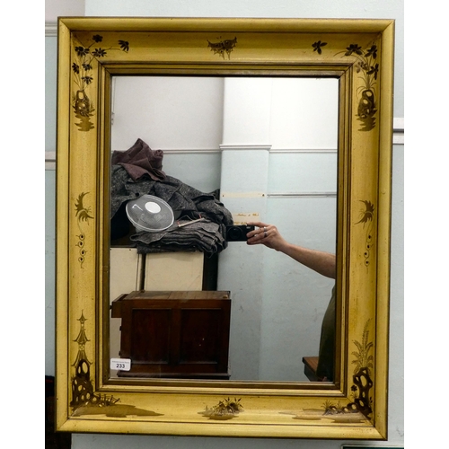 233 - A 20thC Orientally inspired cream painted and stencil decorated, framed mirror  25