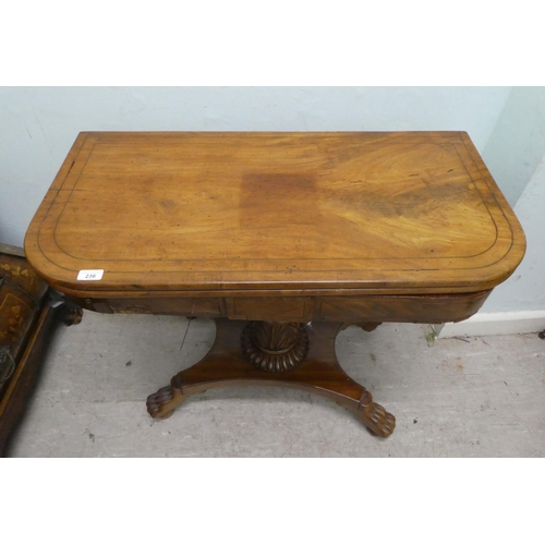 236 - An early/mid 19thC walnut and mahogany D-end tea table, the rotating, foldover top raised on a carve... 