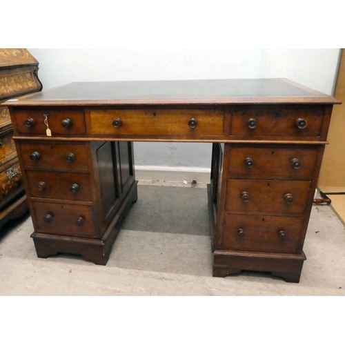 238 - A mid Victorian mahogany nine drawer, twin pedestal desk, raised on bracket feet  30