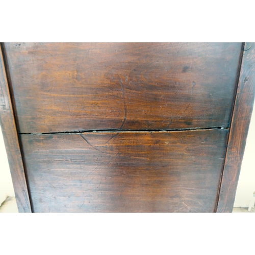 241 - A 20thC Korean brass bound fruitwood chest with an arrangement of cupboard doors and drawers, in two... 