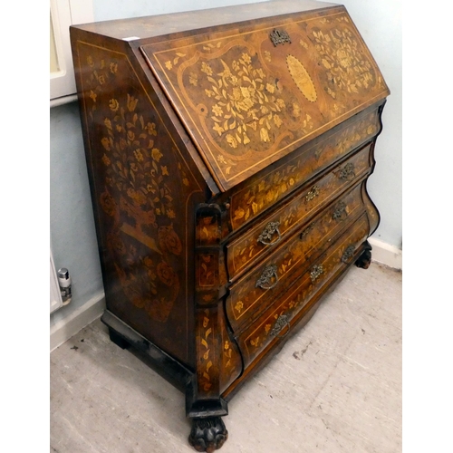 242 - A late 18thC Dutch string inlaid and marquetry bombe front bureau, the fall flap enclosing a similar... 