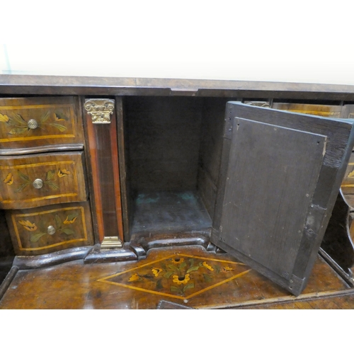 242 - A late 18thC Dutch string inlaid and marquetry bombe front bureau, the fall flap enclosing a similar... 