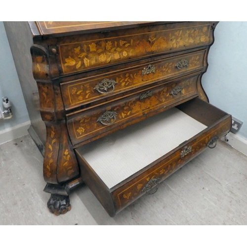 242 - A late 18thC Dutch string inlaid and marquetry bombe front bureau, the fall flap enclosing a similar... 