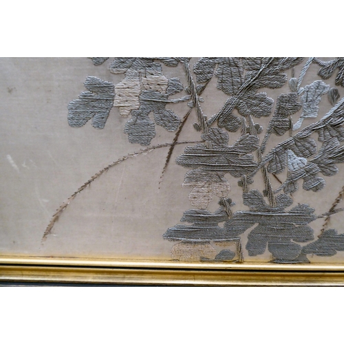 298 - A Chinese embroidered silk panel, depicting birds, trees and fauna  47