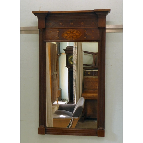 301 - A Regency pier glass, in a satinwood inlaid, mahogany inverted breakfront frame  34