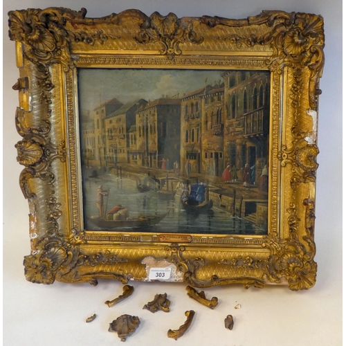 303 - A late 18thC Venetian canal scene  oil on panel  11.5