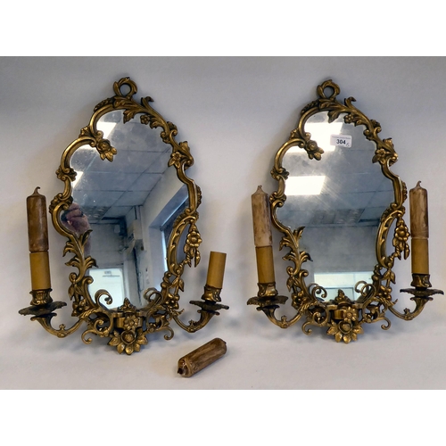 304 - A pair of mid 20thC Rococo design, gilt metal girandole's, each with two adjustable sconces  18... 