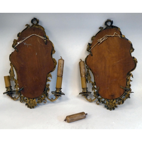 304 - A pair of mid 20thC Rococo design, gilt metal girandole's, each with two adjustable sconces  18... 