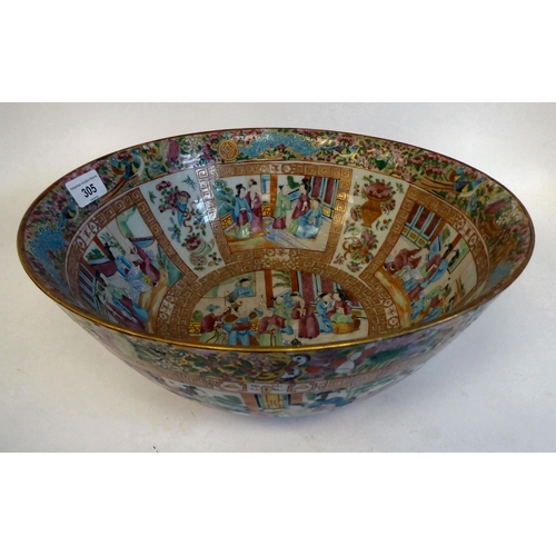 305 - A late 19thC Chinese Canton porcelain bowl, decorated with panels of figures, in a floral border&nbs... 