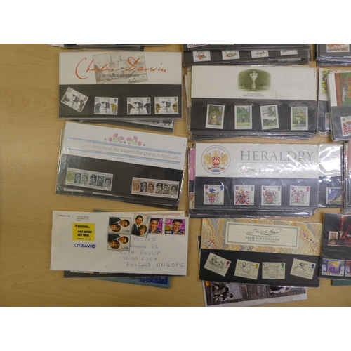 10 - Uncollated, unused postage stamp presentation packs